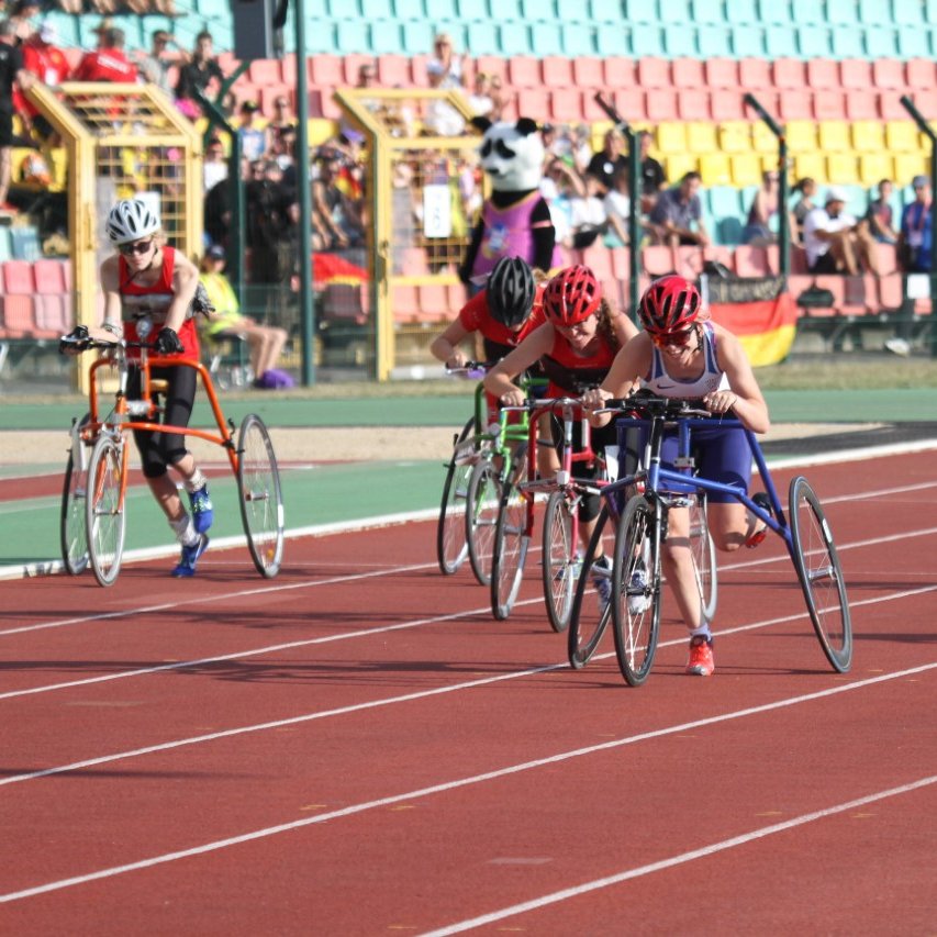 To RaceRun I use a RaceRunner. A RaceRunner is a frame with three wheels which lets me run without faceplanting. Action is running, not pedalling. Some people call it a running bike- to my chagrin. It was invented by Danish engineer Connie Hansen and it's a fairly new invention.
