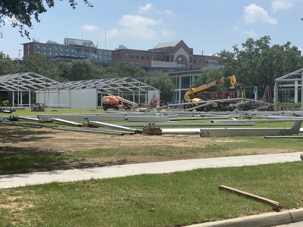 TroyDannen's tweet photo. Portable classrooms going up for social distancing this fall @tulane. Also using Glazer Family Club in Yulman Stadium and Devlin Fieldhouse in Fogelman Arena for classes this fall. #MaskUpWave https://t.co/oQUDFhbrUu