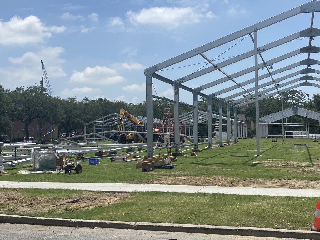 TroyDannen's tweet photo. Portable classrooms going up for social distancing this fall @tulane. Also using Glazer Family Club in Yulman Stadium and Devlin Fieldhouse in Fogelman Arena for classes this fall. #MaskUpWave https://t.co/oQUDFhbrUu