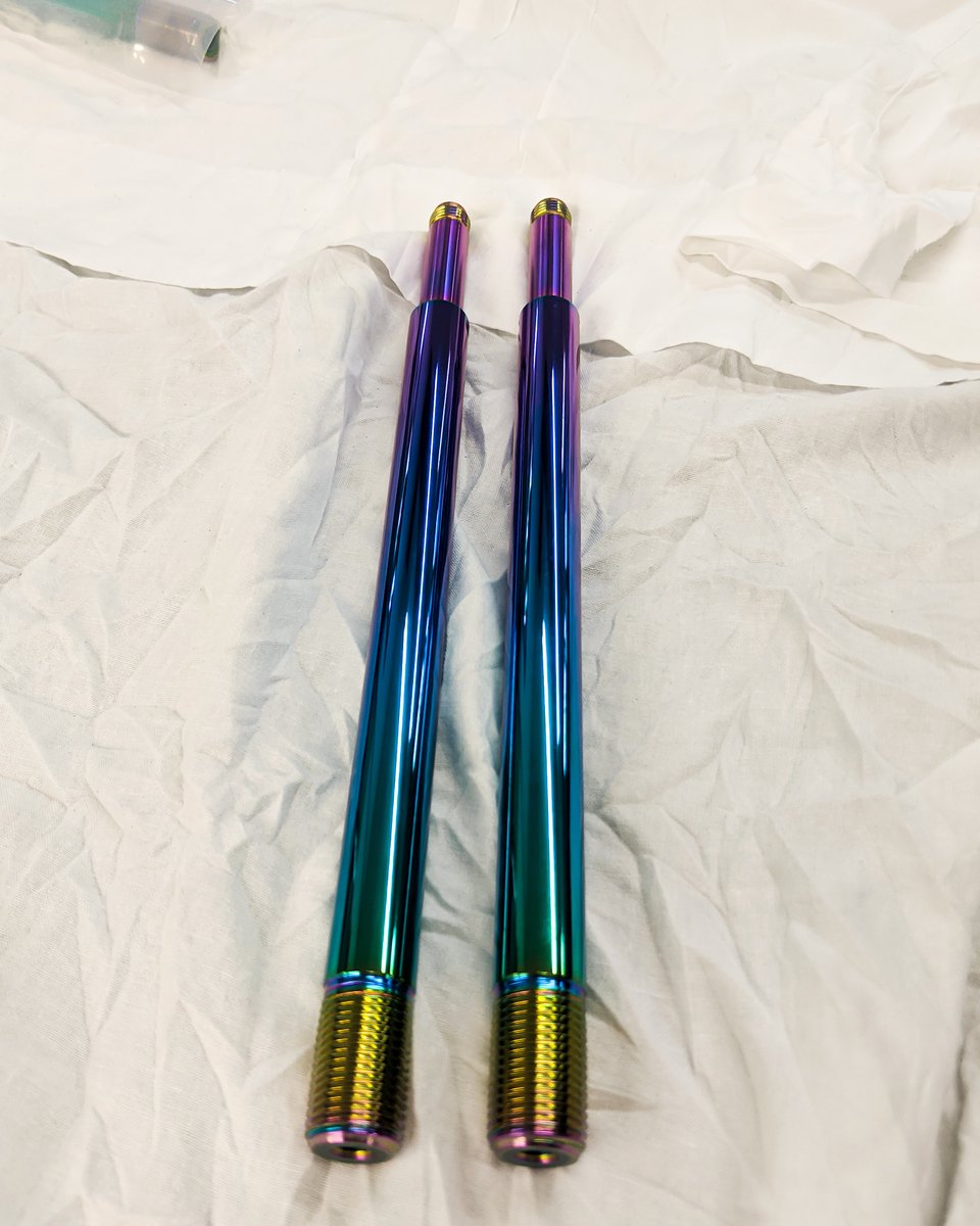 richtercoatings's tweet photo. A pair of motorcycle shock shafts fresh out of one of our vacuum chambers and now rocking our #rainbowpvd. Usually, we post #forktubes but today I'm talkin' Shafts. Can you dig it? 🕵️♂️
#richterprecision #getinfront #shockshaft #motocross #pvdcoating #mx #sx https://t.co/dkhFaNXlPH