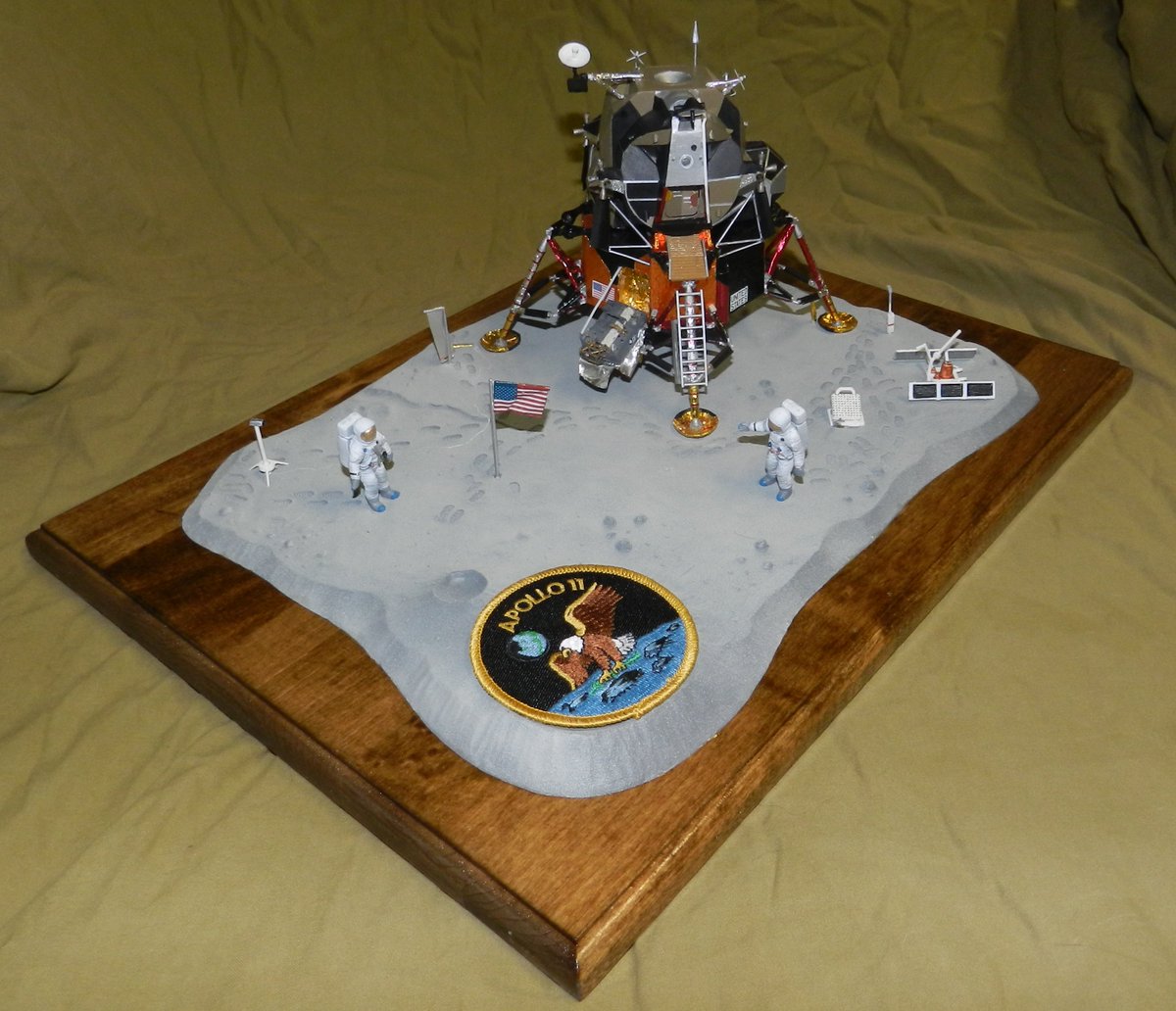 On LM-5 we more clearly see the various thermal blankets on the descent stage, as well as the deployed Modular Equipment Stowage Assembly (MESA) to the left of the ladder. All of the sampling equipment was stored here to free space inside the pressure cabin.