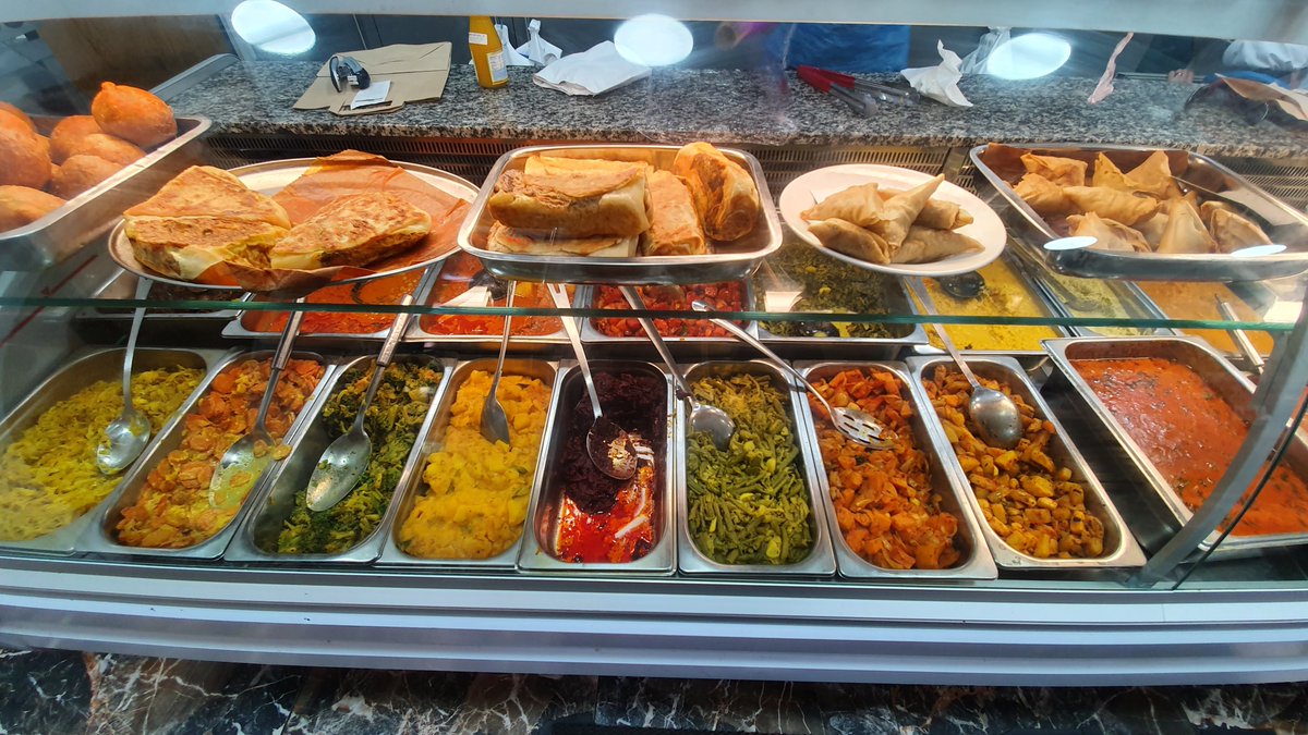 Pop into Everest Curry King for some Mutton Roti, Egg & Fish Rolls and Veg Samosas.
