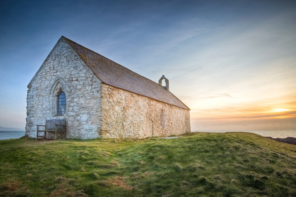 An intensely spiritual setting, the evocative St Cwyfan's Church – on the tidal island of Cribinau – can be reached on foot at low tide.More   https://www.anglesey-history.co.uk/places/churches_and_chapels/Llangwyfan/index.html  https://britishlistedbuildings.co.uk/300004382-church-of-st-cwyfan-tudweiliog#.XwiUAJNKjlw  https://www.buildingconservation.com/articles/limeworkstcwyfan/limeworkstcwyfan.htm