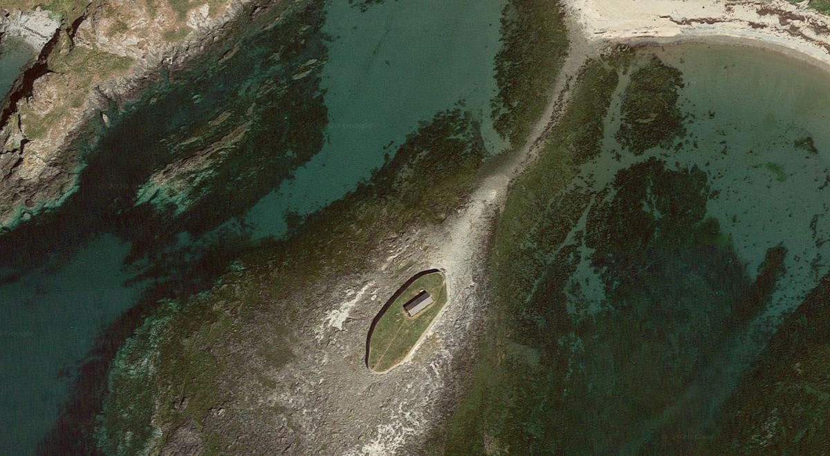 While the placement of "Eglwys Bach y Môr" (Little Church in the Sea) may seem perilous, it wasn't always so. St Cwyfan's was built at the end of a peninsula between two bays, Porth China and Porth Cwyfan.But the sea slowly eroded the coastline, and the peninsula was cut off.