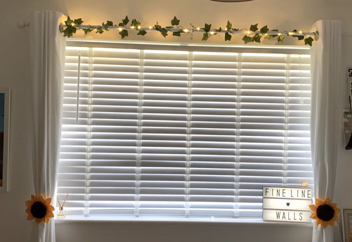 I also bought new blinds, curtains and a curtain pole and I added leaf fairy lights to the curtain pole, sunflower curtain ties and a light box to my windowsill, these make it very cosy at night