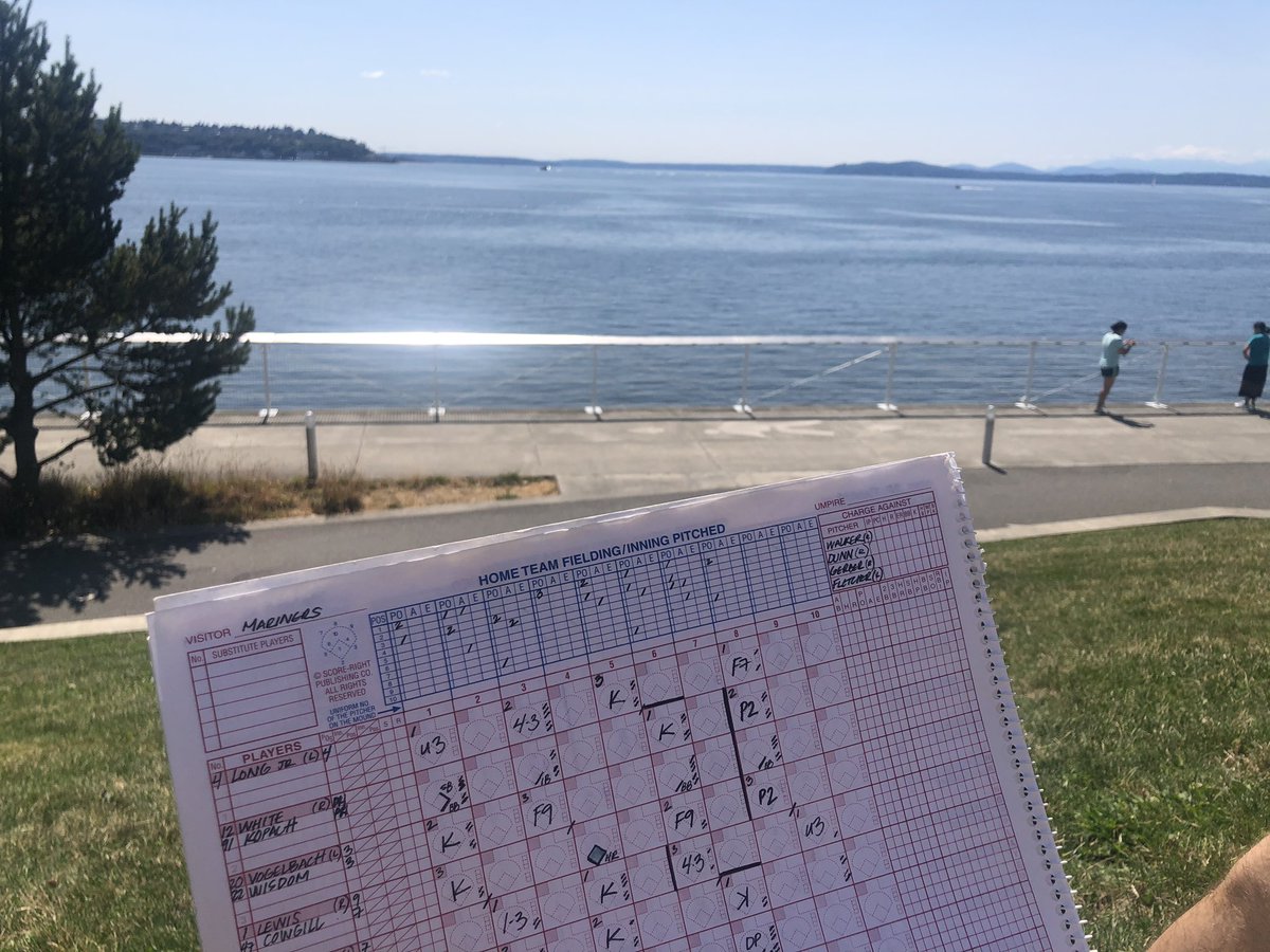 TheLydiaCruz's tweet photo. sitting in the sun (socially distant &amp; masks on), listening to the sounds of @Mariners baseball on @710ESPNSeattle 

yes I brought my scorebook I am nerd after all 2020 can’t take that away from me https://t.co/NjwaOq5iZn