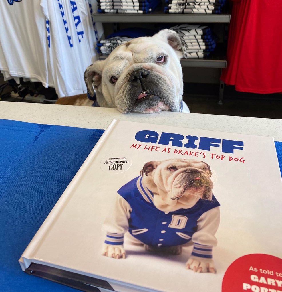DrakeUGriff's tweet photo. The OG went back2work today!I offered to tag along. You know,to be his caddy. He signed some📚w/the author of his memoir at the @drakeuniversity bookstore. If you buy there,it’ll be signed-BY THE OG! (Note #GriffSocks now in stock!) #OriginalGriff #ForeverOurDog @DrakeUniversity https://t.co/n6bElPKhd4