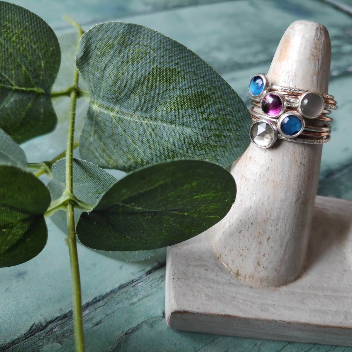 SeadragonSilver's tweet photo. Happy #Stackerday! Sky blue topaz, blue paua shell, grey moonstone and rhodolite garnet sterling silver and rose gold-plated stacking rings #seadragonsilver #silver #jewellery #handmadejewellery #handcrafted #silversmithing #opthandmade #supportsmallbusiness #Norfolk #England https://t.co/iTbLbYh0hx