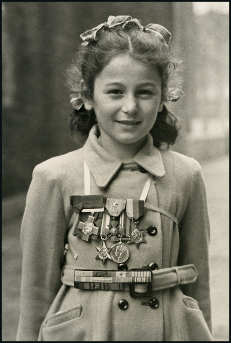 Her first mission was successful, but her second mission led to her capture. She was executed at the age of 23, leaving behind a 3 year old daughter, now aged 78. Tania is pictured wearing her mother's George Cross medal.