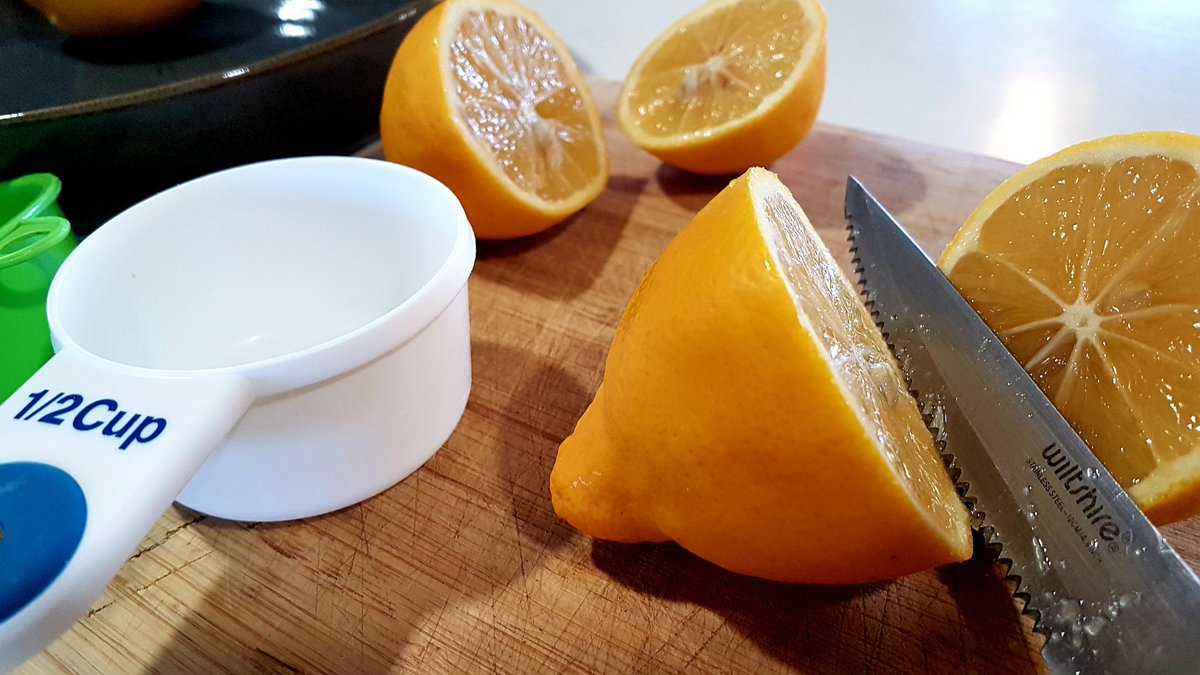Now slice & squeeze 1/2 a cup of lemon juice. (Or, if you don't have lemons, just pour a half cup of lemon juice from the bottle).I love these first two steps; you get the fresh, bright fragrance of lemons all over your hands and into the kitchen!