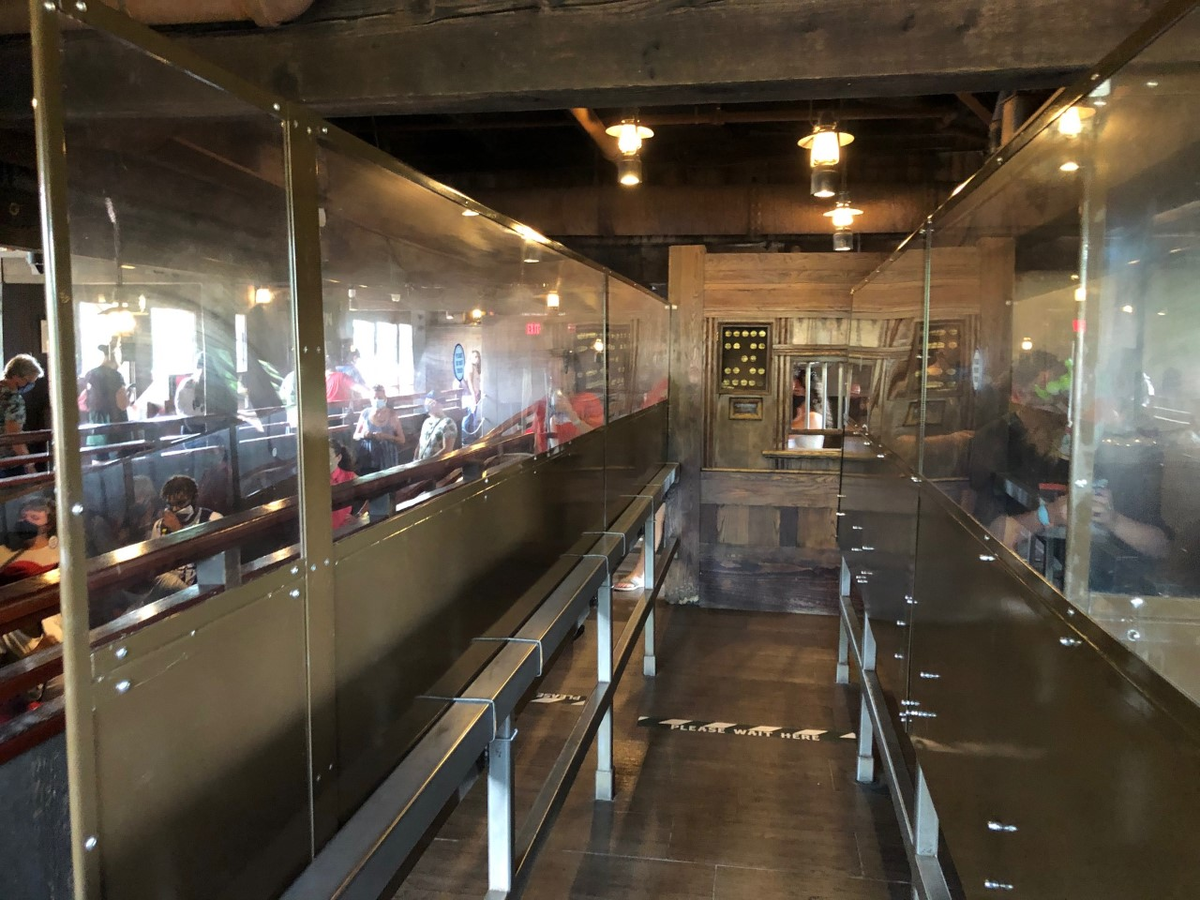 10:38 a.m.: Big Thunder Mountain Railroad’s rustic queue has been carved up into a rabbits’ warren of plexiglass corridors, preventing guests from making contact. Interactive elements that once entertained guests in line have been blocked off, or disabled. :  @skubersky