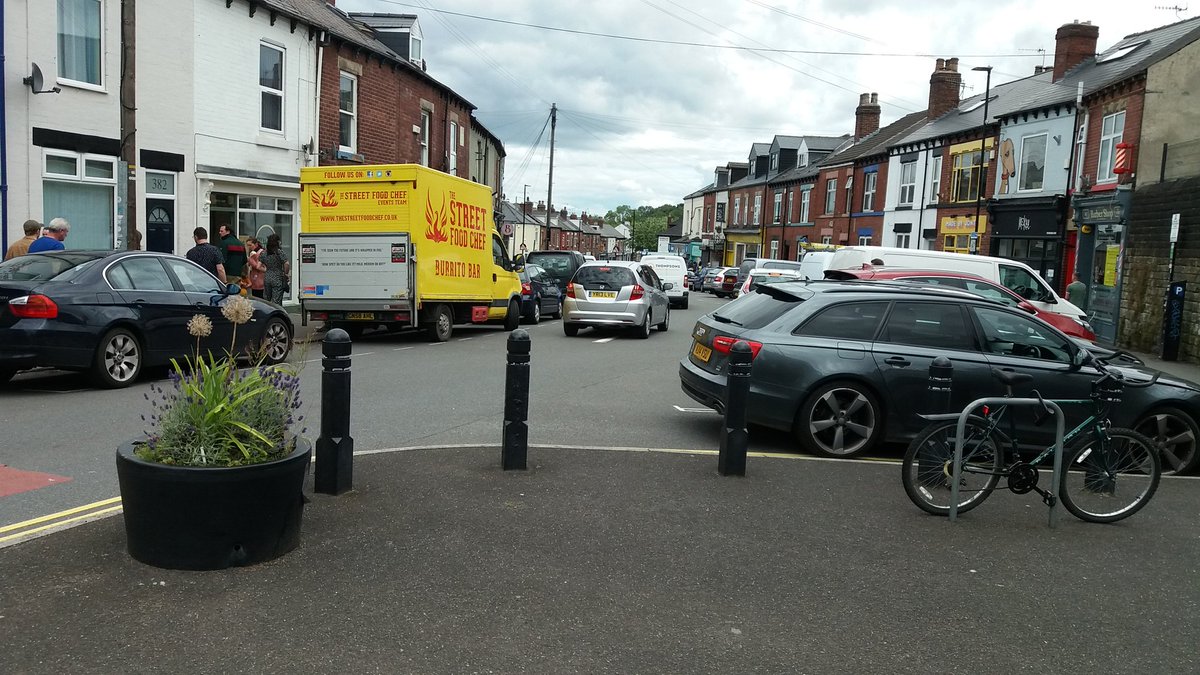 DouglasJSheff's tweet photo. Sharrow Vale Rd is an amazing area but look how much surface area is given over to car storage.  Imagine what it could be like. #LowTrafficNeighbourhood https://t.co/yrPTFksPCl