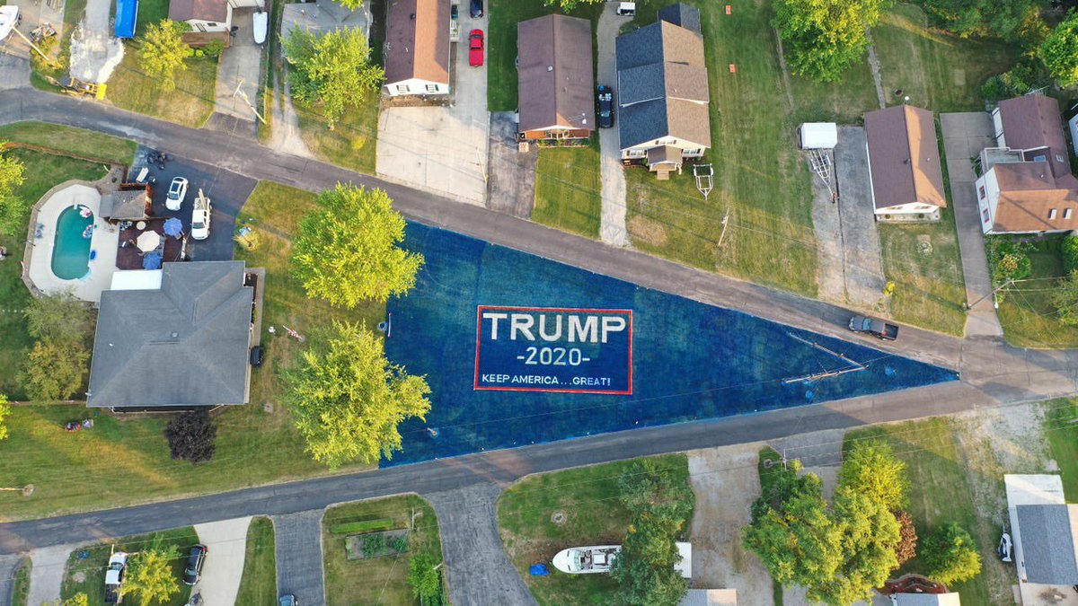 .@realDonaldTrump Ohio man wants to re elect you TRUMP BANNER It took J.R. Majewski about 120 gallons of paint to create the 19,000-square-foot banner, which spans nearly the entire length of his long, triangular front yard on West Elmore Road in Bay Township