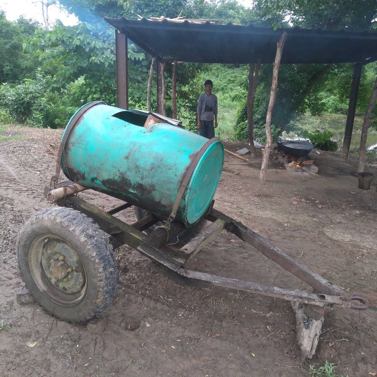 PullockD's tweet photo. Tea being brewed for those who make tea... look at the filthy container in which the brew would be ferried to garden workers engaged in different parts of the estate. This is the true story of Assam tea... https://t.co/iDCVzabTHB
