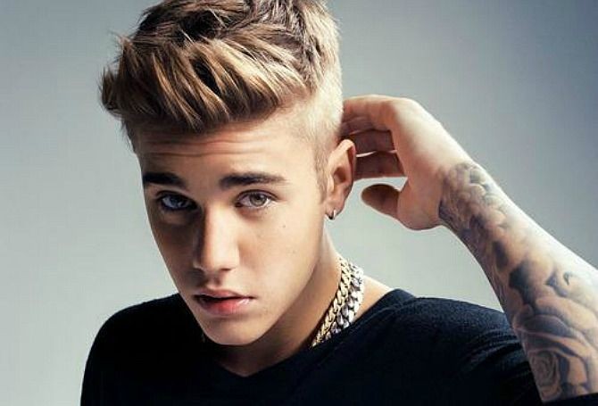 Moving on to Biebs and the once innocent looking teen has rocked things up  with a  Capital