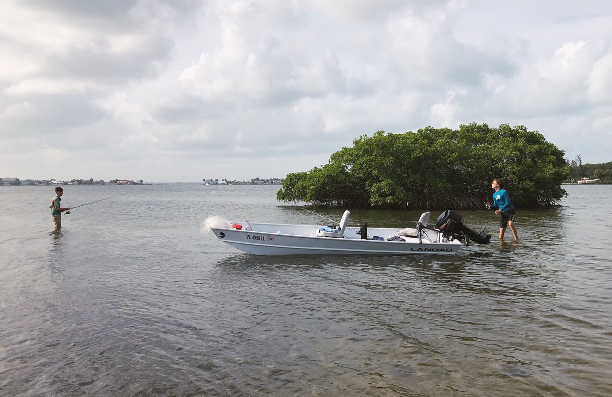 Jon boat fishing in the bay