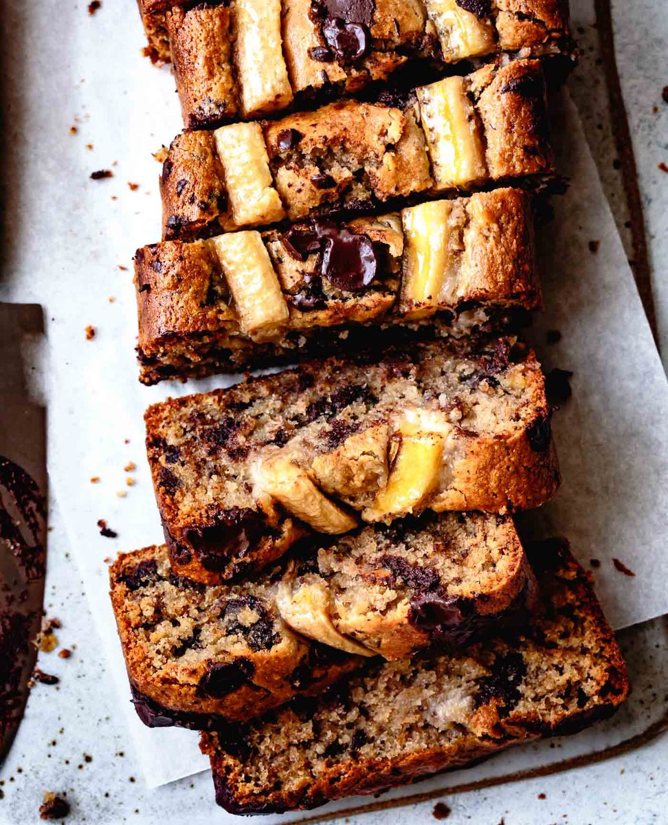 A thick slice of toasted 🍌 banana bread is just what we need this morning. Especially this version from <a href="/AlannaTT/">The Bojon Gourmet</a> —it's full of sweet banana flavor, chunks of melty chocolate and toasted pecans. 

Full Recipe: soo.nr/nzyo