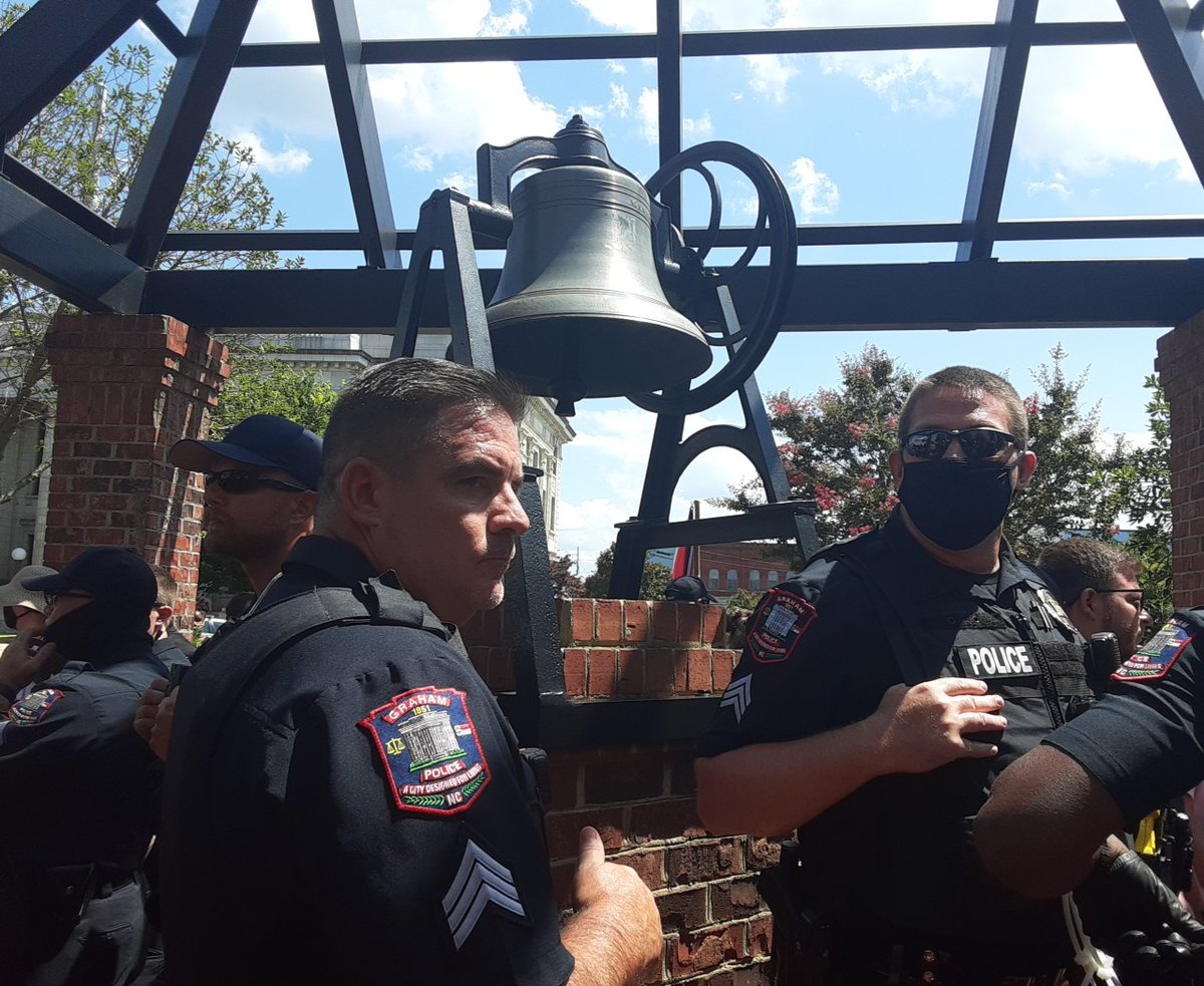 A couple racists came back to try to retake the bell. As predicted, cops weren't cool with Black people ringing it and now have the bell surrounded