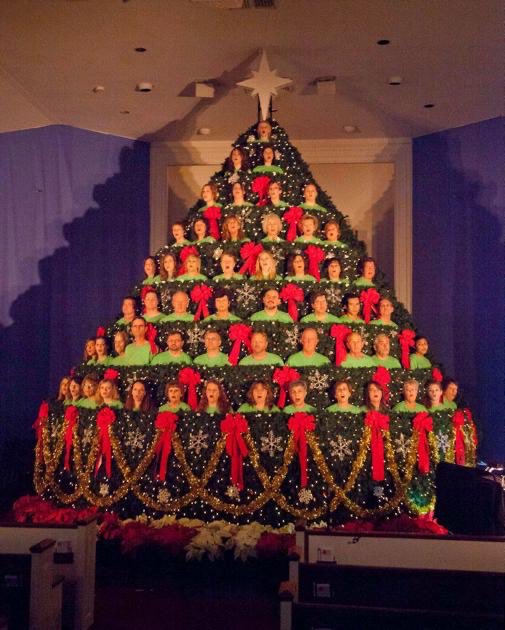 ETA The Living Christmas Tree! It’s a set of risers with green swags and a metric buttload of lights. The choir stands in it and sings. We had one on each side of the big cross and the soloists were the angels at the top and had wings with styrofoam packing peanut feathers.