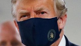 AnnCoulter's tweet photo. Presidential seal looks cool on Trump's mask! Everyone should add a personal crest to theirs.  Only problem for Biden is, Mr. Magoo is a registered trademark. https://t.co/9fB95KmiNx