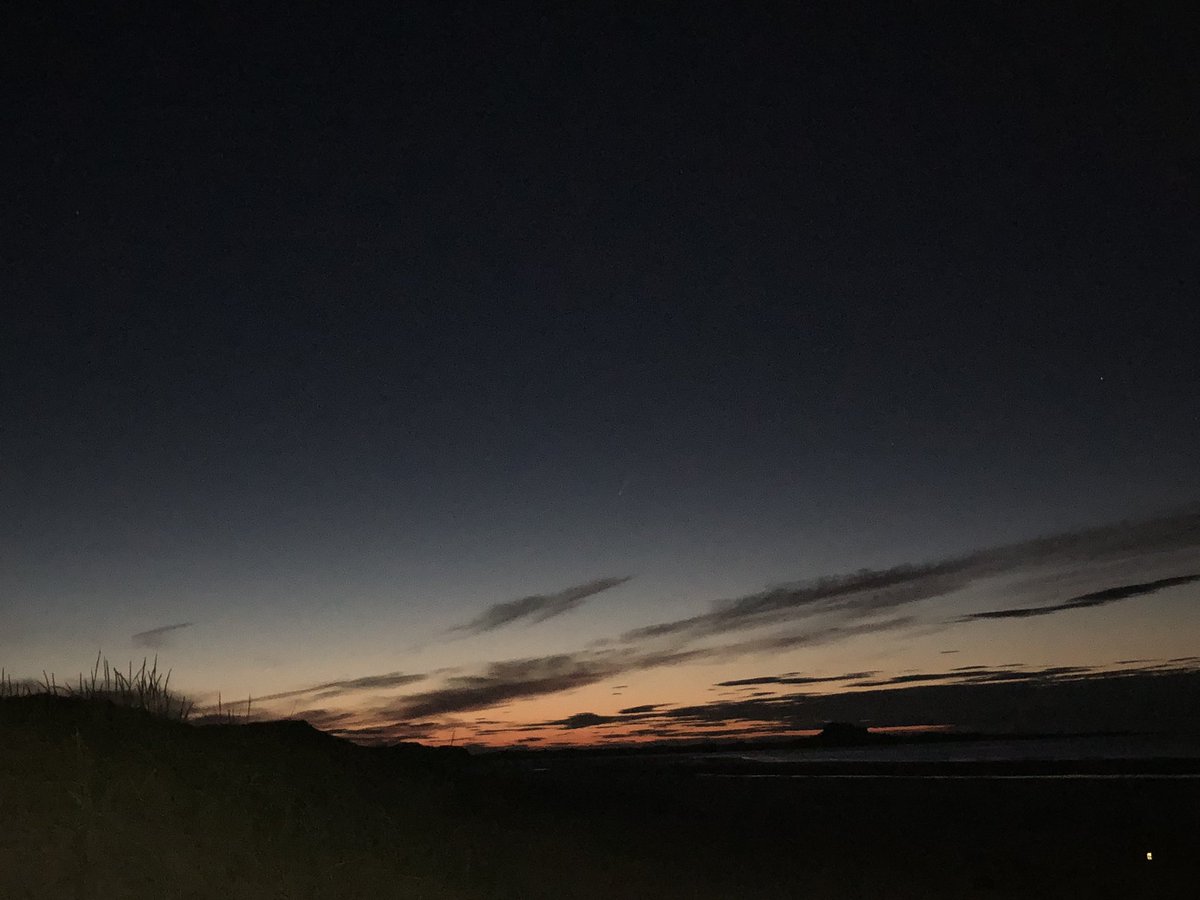mardybumkate's tweet photo. Comet, noctilucent clouds, mars, Jupiter, Saturn and an orange moon.  Sitting on a deserted beach at midnight, finished with a trip to dunstanburgh castle - homeward bound at 4.15am.... #wantmybed https://t.co/UCnkhqudZe