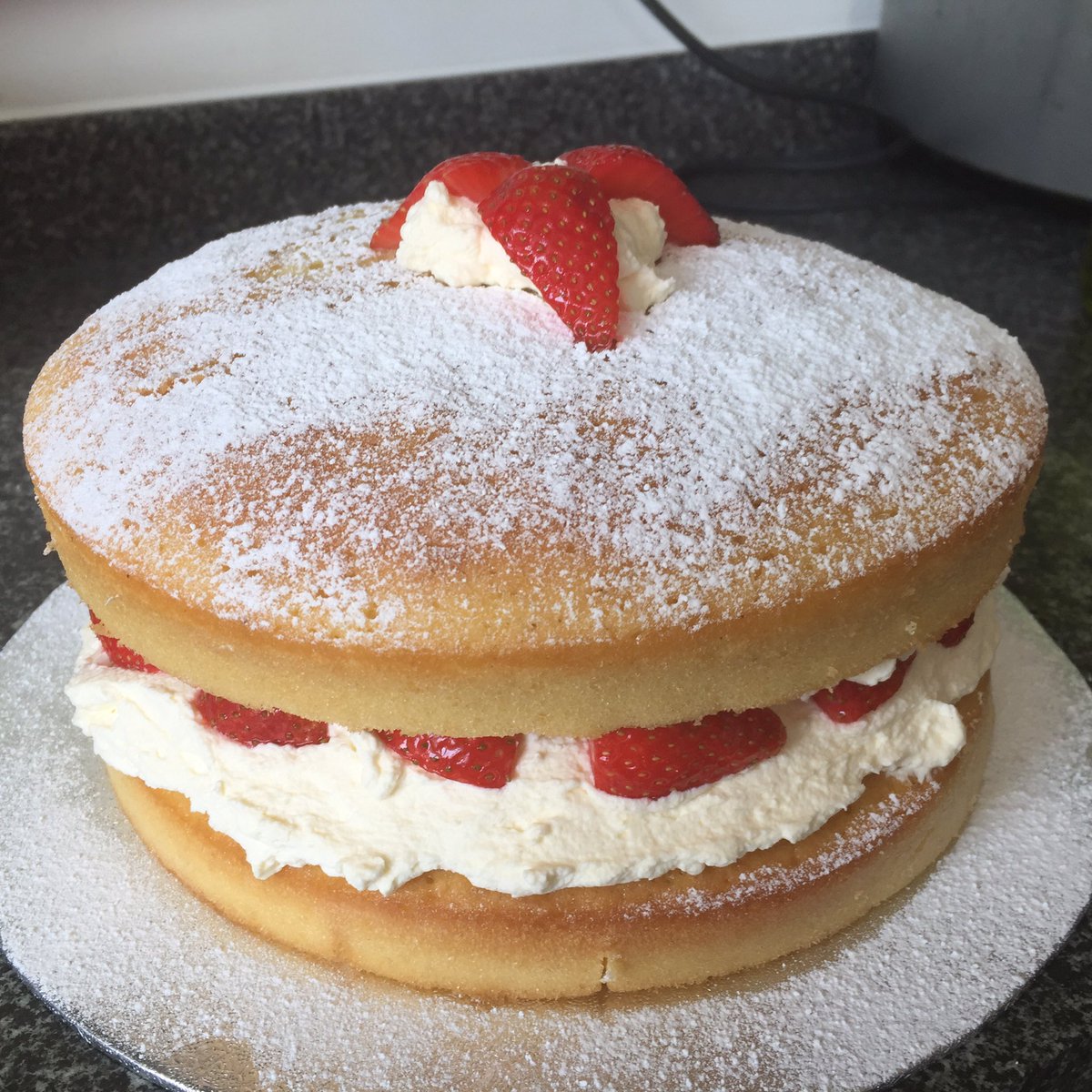Traditional Victoria Sponge Cake but with a vanilla double cream and fresh strawberry filling. #cake #victoriasponge #strawberries #vanillacream #partytime #birthdaycake #teaparty #lytham #lythamstannes #fyldecoast