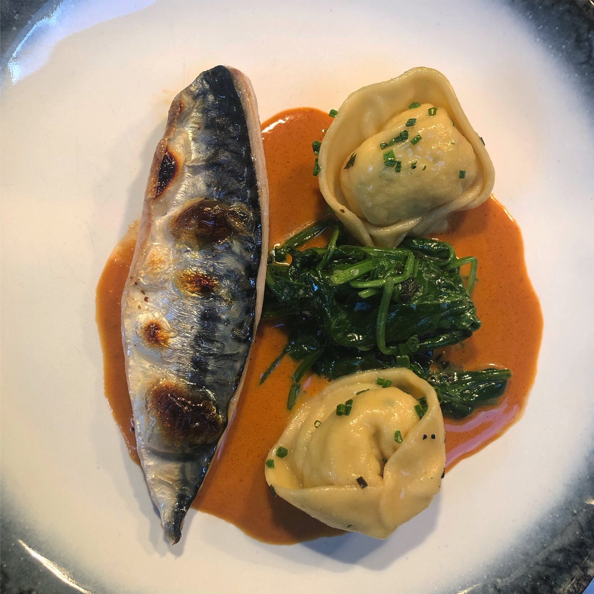 I always enjoy our daily market fish dish, but last nights really shows simple great produce can be amazing...

St ives bay mackerel just cured slightly and torched...

Hand picked crab tortellini bound fish fish mousse, in a lovely rich shellfish bisque!!