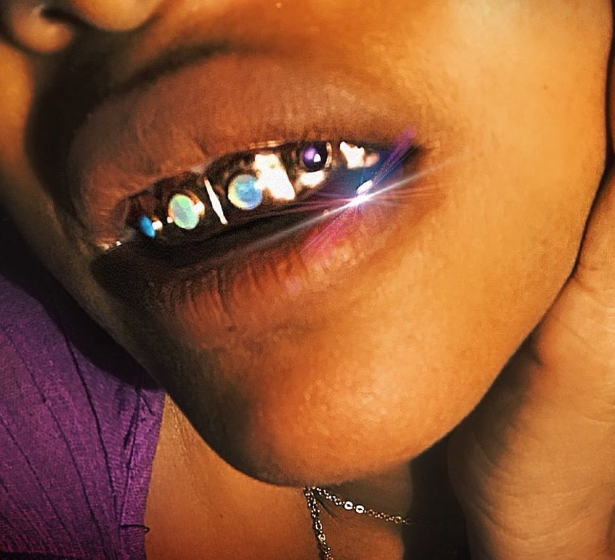 Dental embellishments were also worn by Mayans, who drilled holes in their teeth and replaced them with stones. This concept influenced Erykah Badu’s 2015 grill. “Opal, Amethyst, Turquoise and Moonstone. Inspired by a Mayan skull found in Mesoamerica circa 500 BC” —Badu