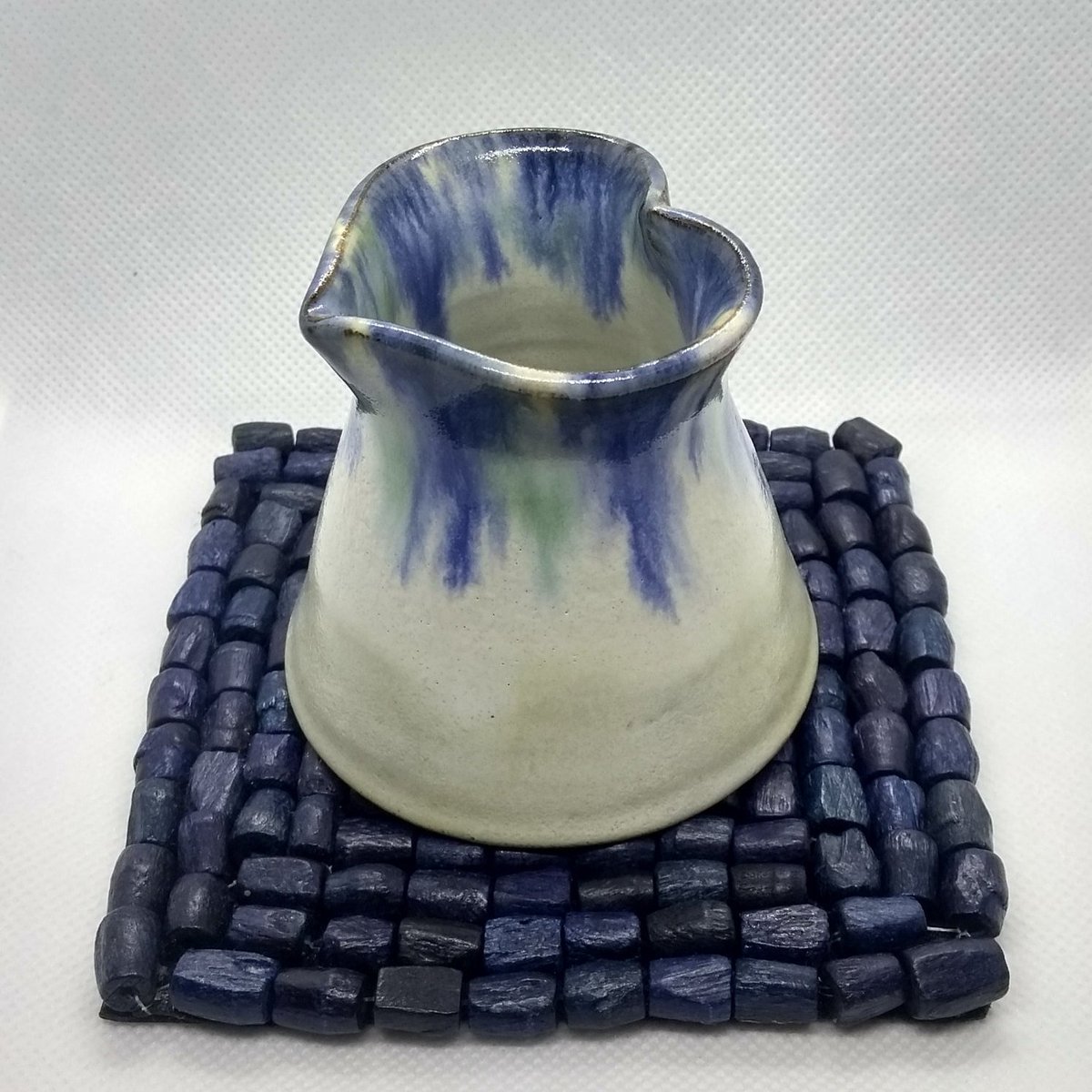 TrimbyCeramics's tweet photo. @UkCraftersHour Evening #ukcraftershour Hope you 💙 my #etsyshop item: Handmade pottery creamer jug, silky blue white glaze + blue/green drip decoration #heartgift #juggift #ceramic #minijug #giftforher #pottery #9thanniversary #heartgiftidea #handmadeUK https://t.co/yJOo0ZnDpv https://t.co/5FH4f74SIH