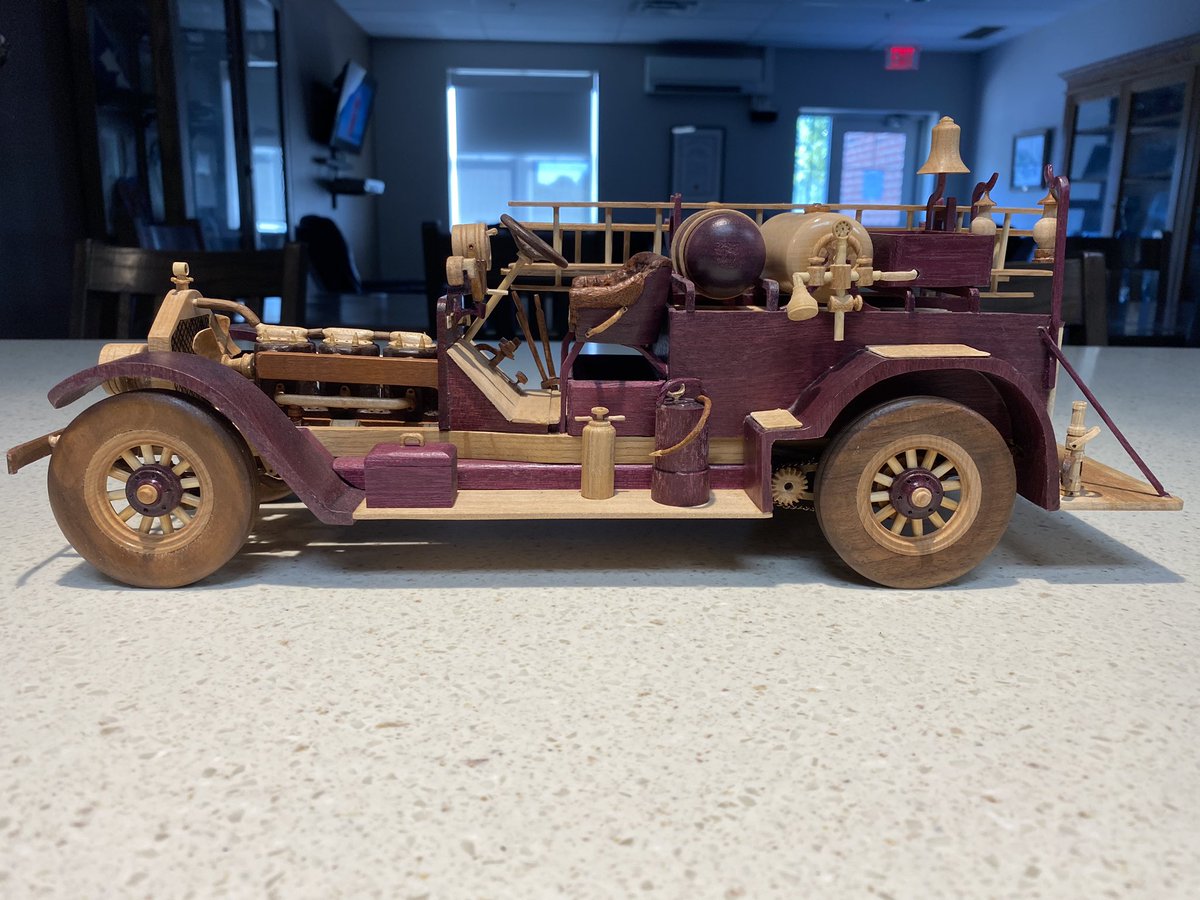 OrilliaFire's tweet photo. Last week @livingbyyyz took pictures of our apparatus including our prize 1923 Lafrance. This week one of our staff’s dad completed a wood exact scale replica. Thanks Tom Barks. Each colour is a different kind of wood. Amazing detail. #honourrespecttradition #fleetfriday https://t.co/PcLkilQ4gF