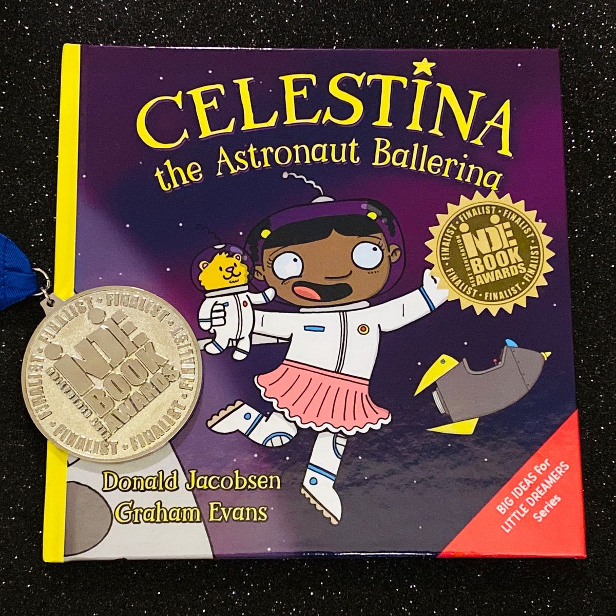 DonaldMJacobsen's tweet photo. I'm happy to announce that Celestina the Astronaut Ballerina has won a Finalist Medal in the Next Generation Indie Book Awards Children's Picture Books 0-5 Years category! 🥇 #kidsbooks #childrensbooks #picturebooks #picturebook #readaloud #womeninscience #womeninspace #stem https://t.co/zNOBsAdBE2