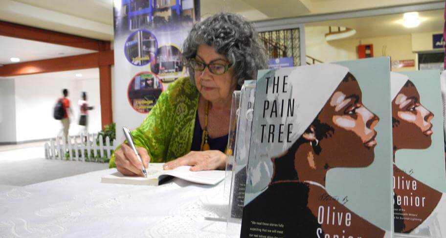 bocaslitfest's tweet photo. No Caribbean bookshelf is complete without
@olivesenior! Hear about The Pain Tree (@cormorantbooks), which won the #OCMBocasPrize2016, in her #SpacesBetweenWords podcast conversation by @UWI_StAugustine: https://t.co/XsGkPNjXAE.
#CaribbeanLiteratureDay12july2020 #bocasat10 https://t.co/pEkonCbhvW