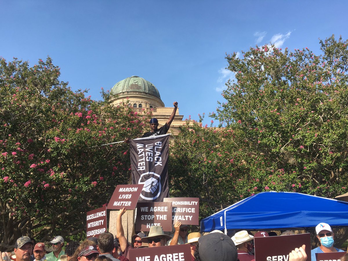 KennySWiley's tweet photo. Texas A&amp;M track student-athlete Infinite Tucker has climbed the “Sully” statue and draped it with a Black Lives Matter flag. https://t.co/MyPhSCiLVl