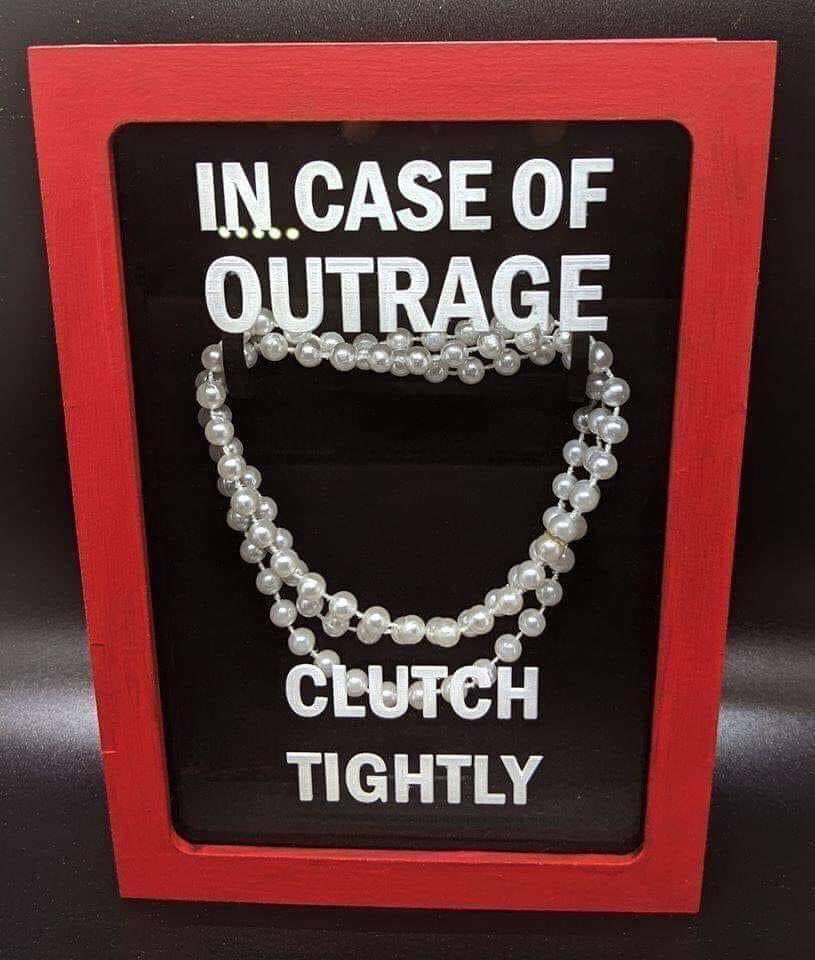 clutching pearls meaning