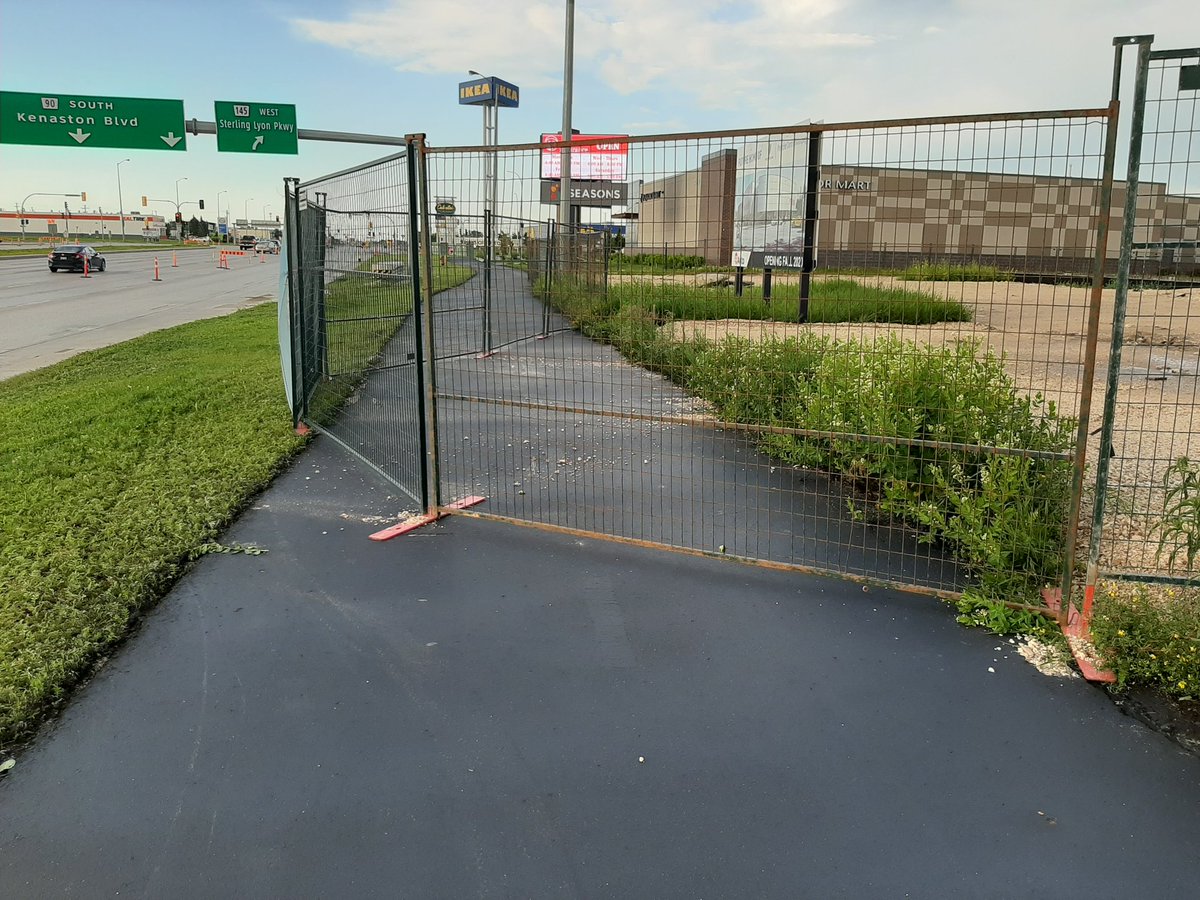 Hey <a href="/cityofwinnipeg/">City of Winnipeg</a> or <a href="/LedcorGroup/">Ledcor</a>, there's a fence around the new <a href="/PorscheCanada/">Porsche Canada</a> dealership at Kenaston and Sterling lyon that has been blocking the sidewalk/bikepath for  the past week. Can someone fix this please?