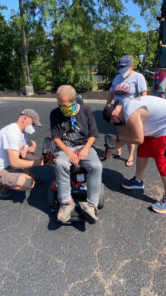 Peter gets a new wheelchair