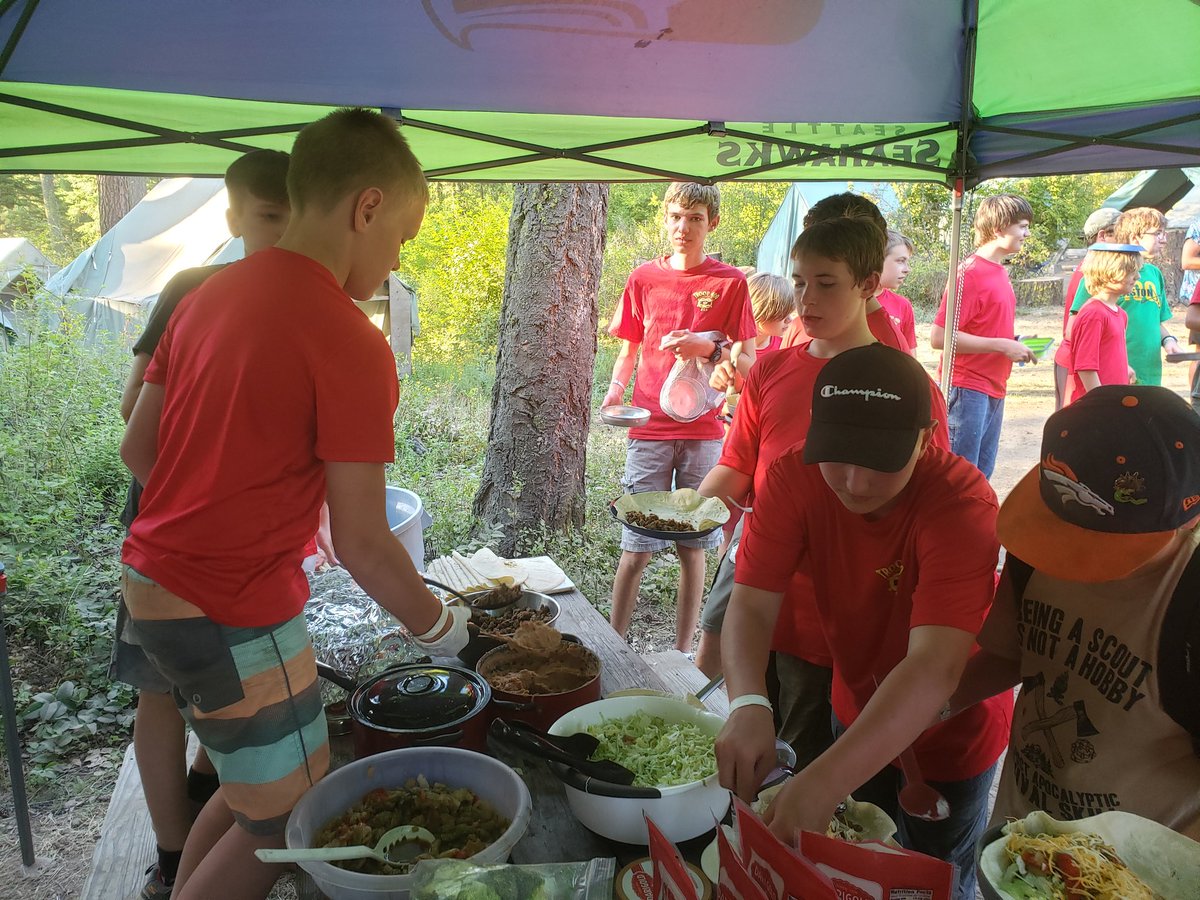 Troop400's tweet photo. Are your boys eating well? Yes they are, our first in camp meal that the cooking merit badge boys prepared https://t.co/bjIpCKNOy8