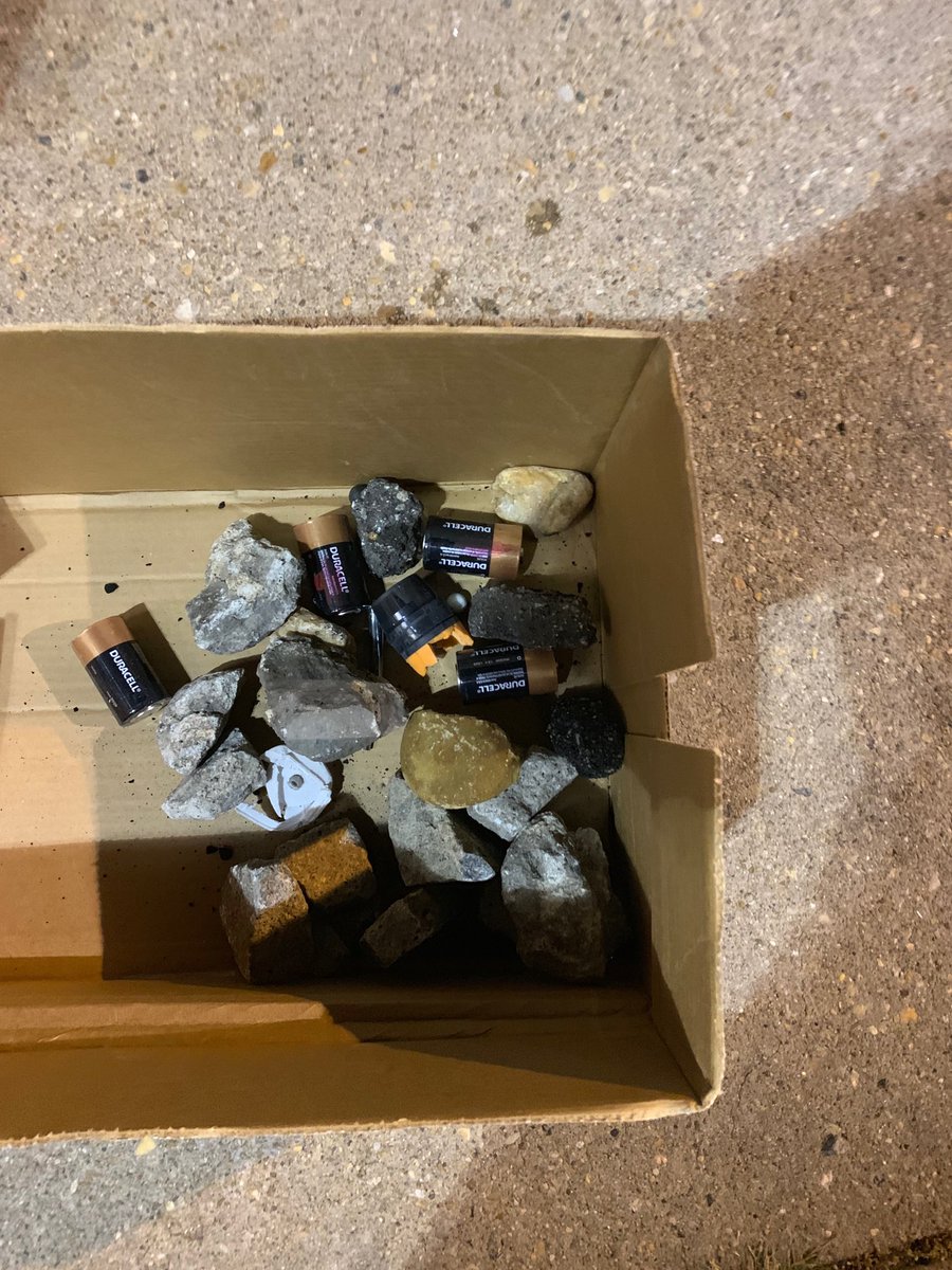 RichmondPolice's tweet photo. Some of the objects thrown at police officers outside RPD Headquarters that prompted an Unlawful Assembly being declared. https://t.co/Rcgx127EH7