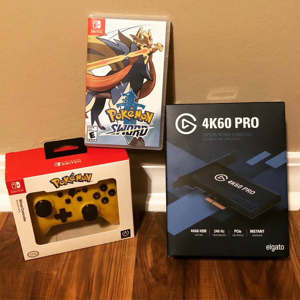 lave_rx's tweet photo. Got some new computer tech and a game to test it out with! Be sure and checkout the stream to watch me play through Pokémon Sword with this awesome Pikachu themed controller! #smallstreamer #switchstreams #pokemon #pokemonsword #pikachu #nintendo #nintendoswitch https://t.co/LIKtSLvrE5