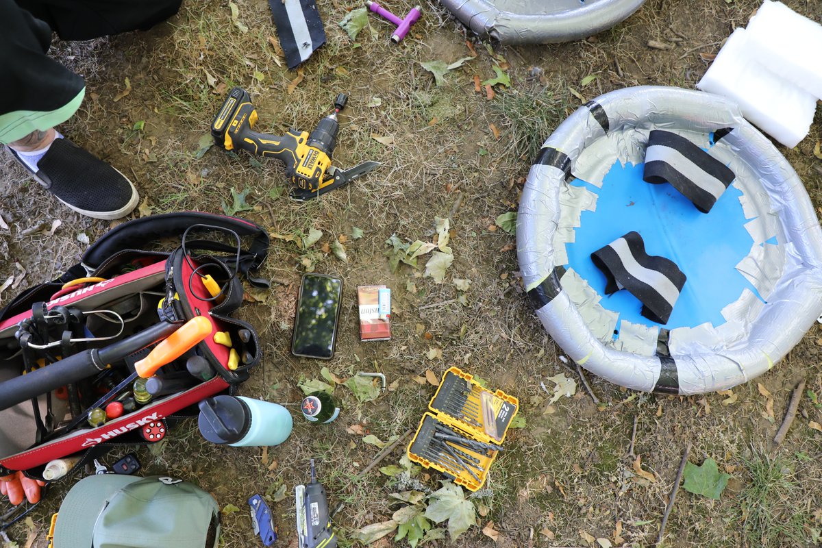 Step 3.) Using a hand drill, a different volunteer makes 6 holes in the center of the plastic. (Shield building sessions are BYOPT: Bring Your Own Power Tools.)