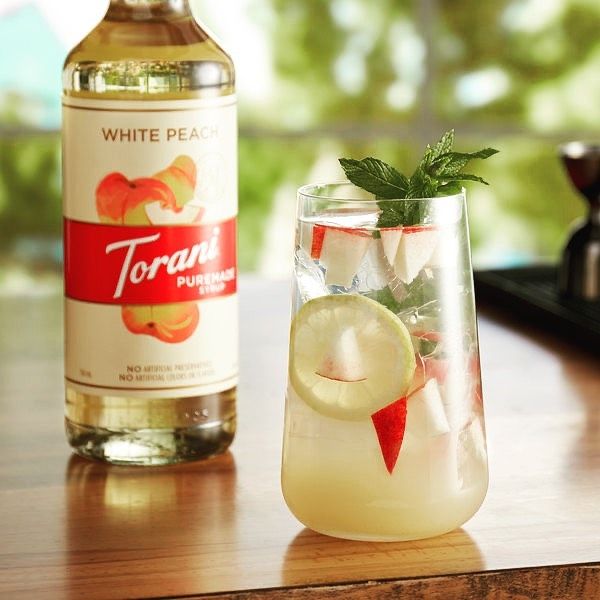 torani's tweet photo. Puremade White Peach stays ripe all summer long. 📷: @berardisfreshroast

#Torani #Puremade #WhitePeach #ToraniFlavors #SummerFlavor https://t.co/wb2gh0LG9H