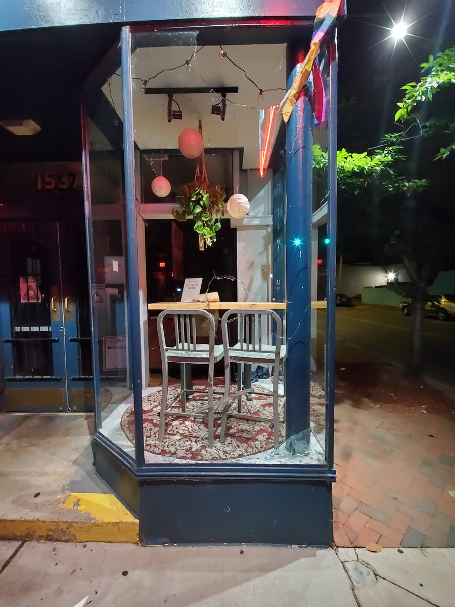 Head down Main Street where there is a confrontation between cops and protesters.On the way, I see they have trashed the front window of Foo Dog.  #RVAprotests  #richmondprotest – bei  Foo Dog: Asian Street Food