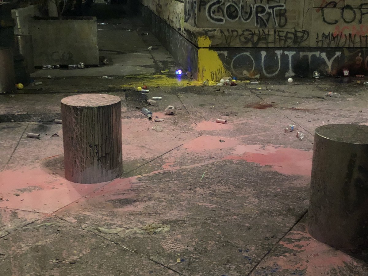 The Feds retreated inside after being covered in pink paint. Also the part of the fence they shoot out of has been coated in caulking.  #blacklivesmatter    #Protests  #pdx  #portland  #oregon  #blm  #acab  #PortlandProtest  #PDXprotest  #PortlandStrong  #WallOfVets  #wallofmoms