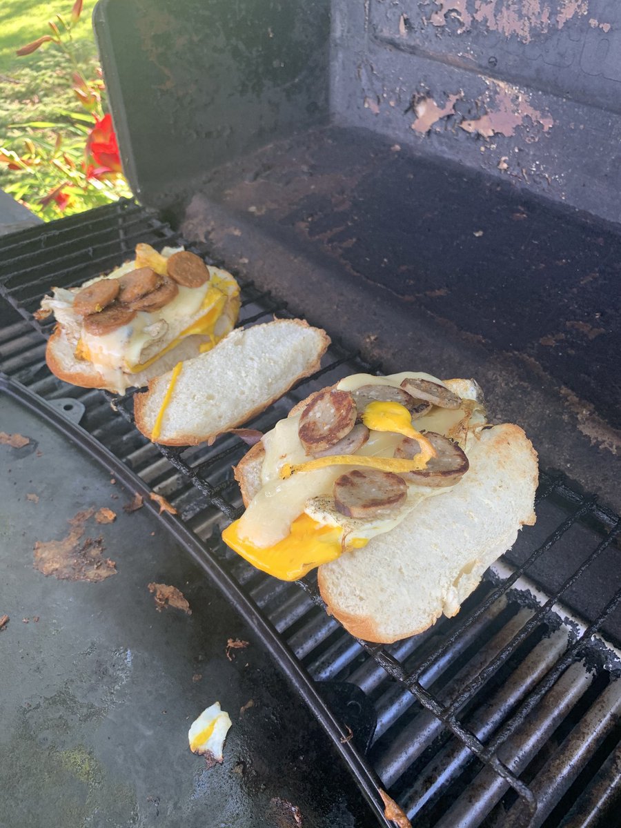 bruceweindruch's tweet photo. Summertime #breakfastsando #wisconsinstyle on the griddle. Egg, sharp cheddar and @lgmeats portobello swiss brat (right) and @BeyondMeat brat (left). The one on the left is kind of jealous. https://t.co/wf9xzOsy11