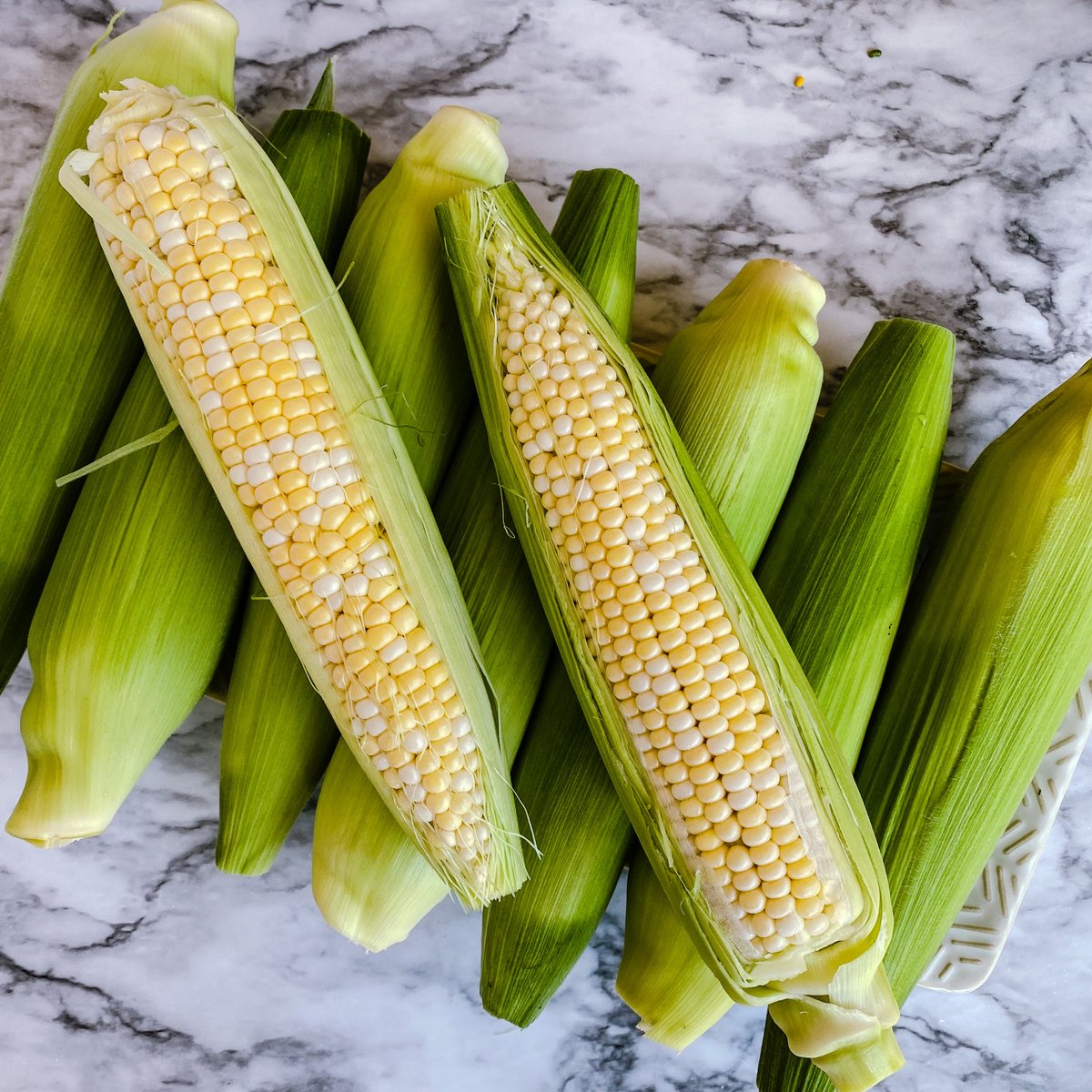 oneotacoop's tweet photo. Local, organic sweet corn is here! What’s your favorite way to cook up sweet corn? Let us know in the comments! #oneotacoop #decorah #foodcoop #localfood #localsweetcorn #sweetcorn #organic #organicproduce https://t.co/3PhWKE8H8N