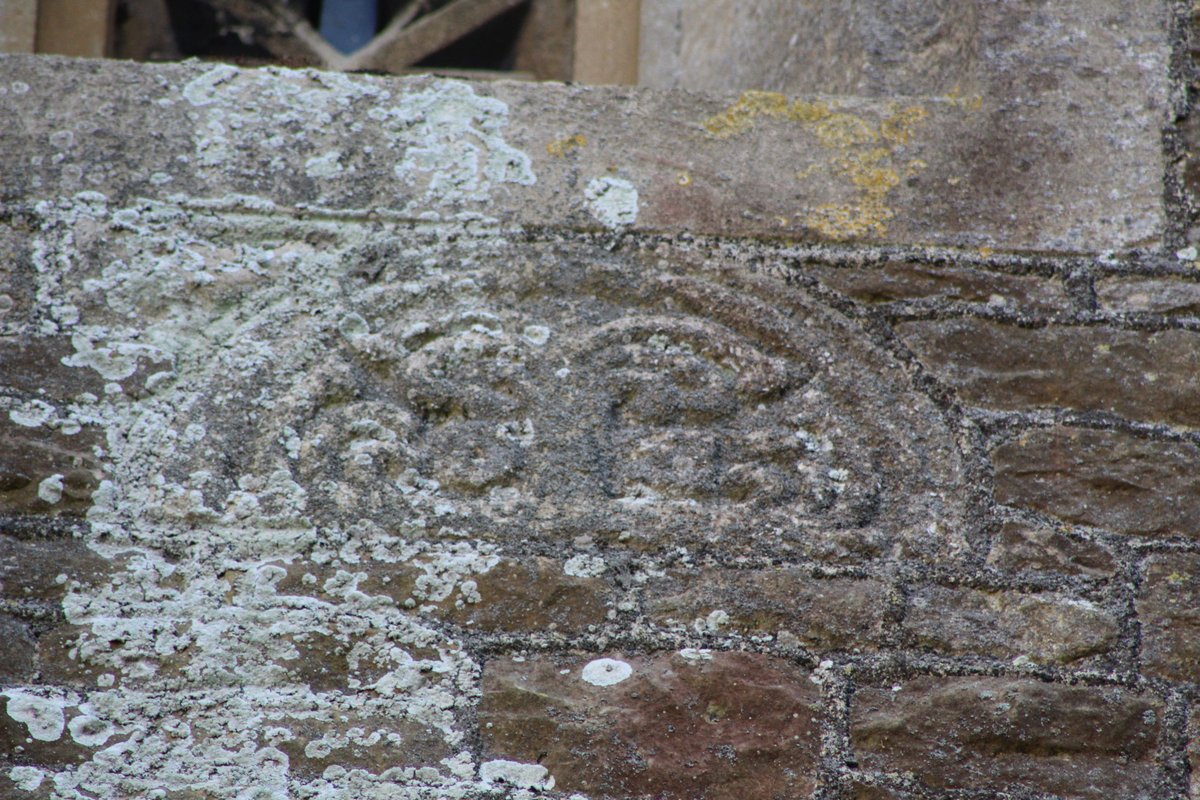 while high up on the N side of the tower is either part of the head of a wheel-type cross, or part of a window-head. Not my area, so... The idea that they both represent fragments of a cross was the inspiration for one of the memorials on the S side, dating (16/24)