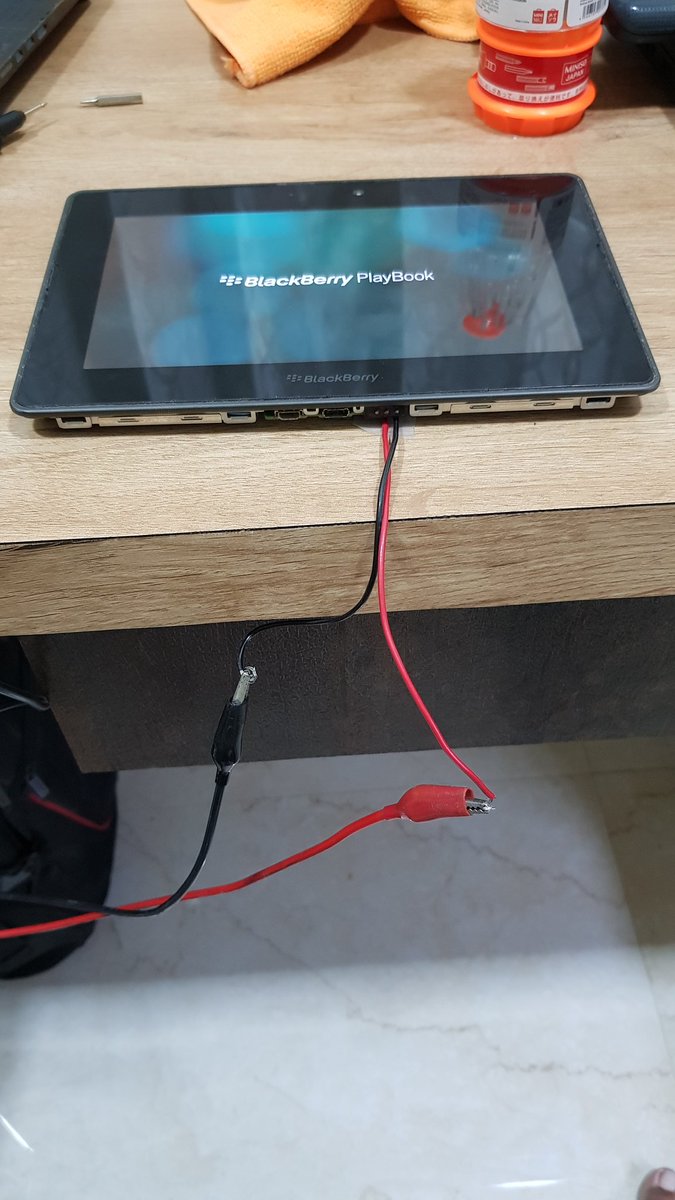 atulkundre's tweet photo. Reviving @BlackBerry #blackberry #playbook #jumpstarting with 12V. Tried USB power cycle method. Faulty charger destroyed the port and few components nearby. It was dead for years. First booted 20 years ago 😂 https://t.co/QOTsvxEWl0