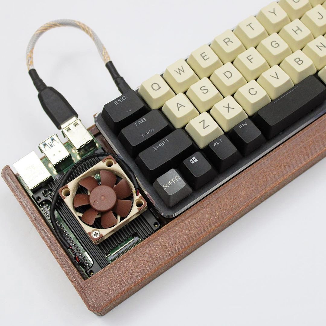 cooptec_pt's tweet photo. Check out this great Noctua-themed Keyboard Computer by @zyvhur! #noctua https://t.co/Lv1uZQ6fcK