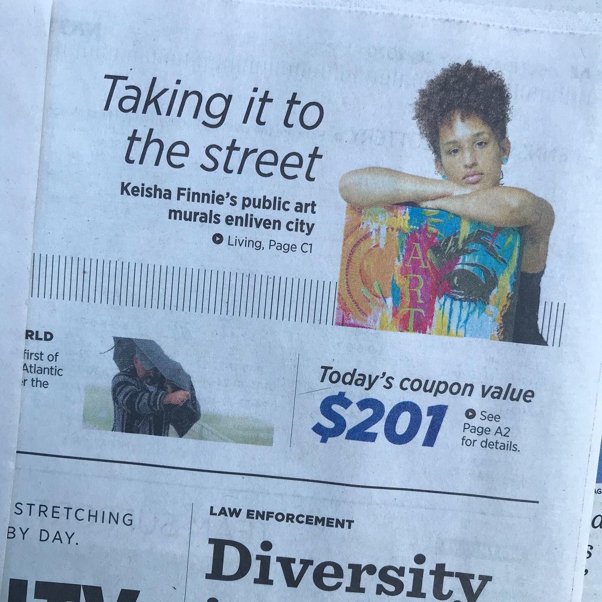 KeishaFinnie's tweet photo. Seeing my face on the front page this morning has me speechless. I don’t know if I’ll ever get used to or believe the great things people say about me, I’m just being myself and it feels amazing to have people accept me for who I am. Thank you for letting me be me. 🥺🖤🎨 https://t.co/1wvCpZ2ocr