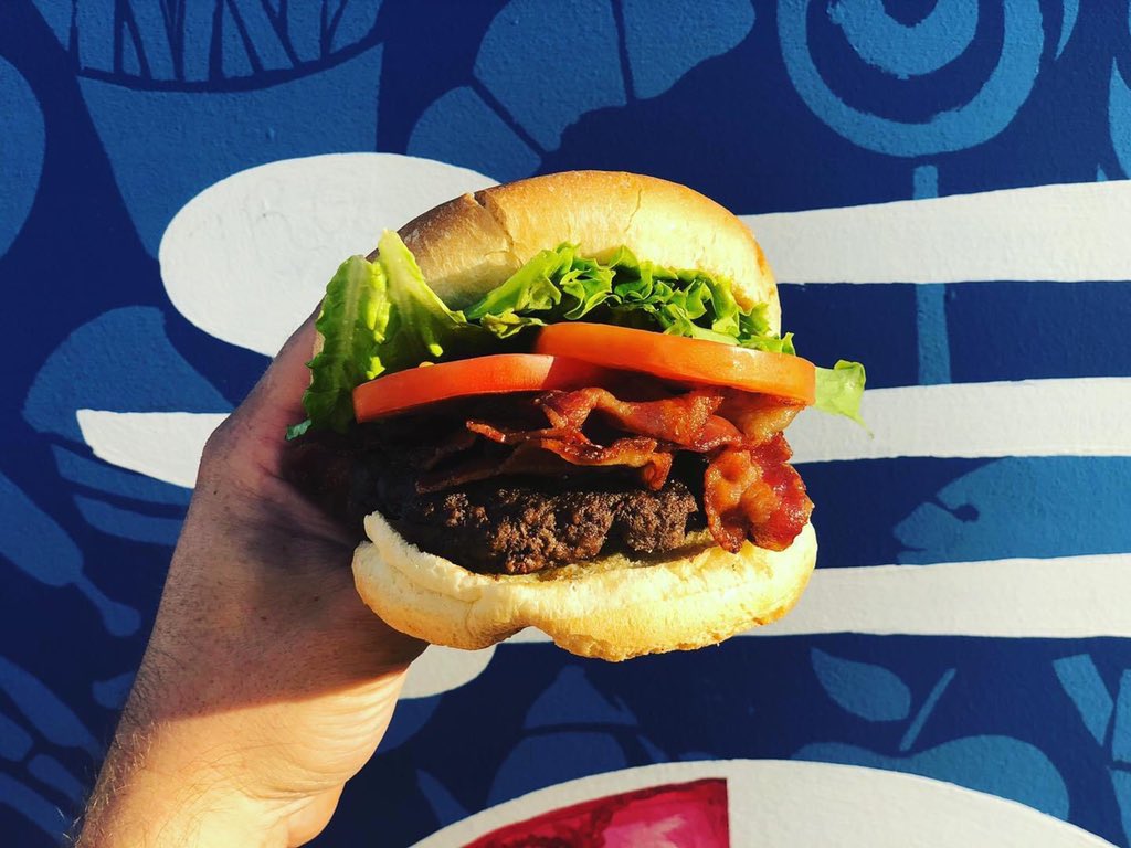 CarnivalCafe1's tweet photo. Say Hello to the BLT BURGER! 
6oz seasoned ground beef patty hand pressed with our signature chuck,  crispy maple bacon! Thick cut tomatoes, fresh lettuce, topped with salt and pepper and mayo.  
Simply yet delicious ! My new favourite🤤 
#yyc #yycfood #foodblog https://t.co/kZwZwY0bb9